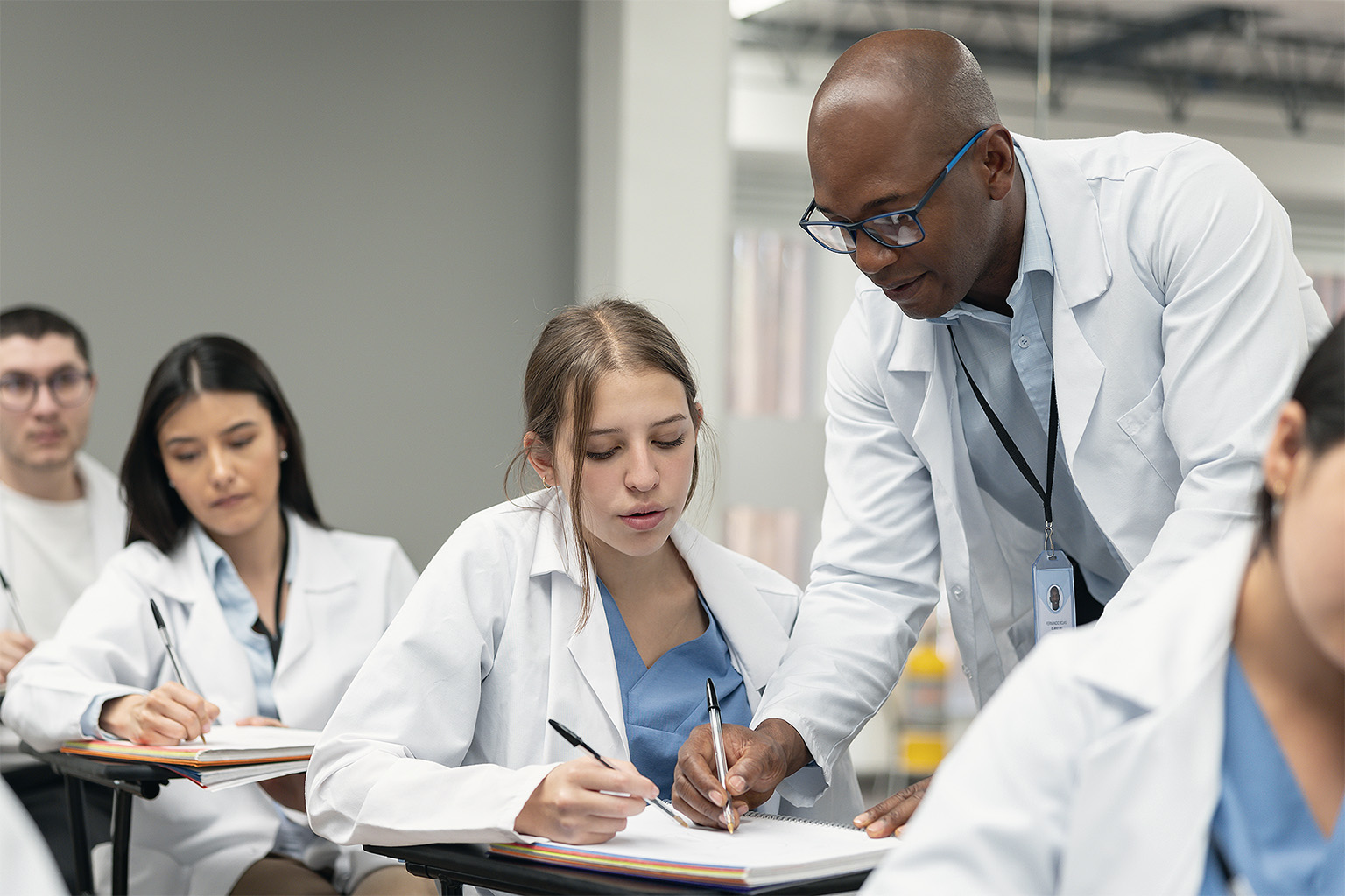 Doctor teaching students in medical school